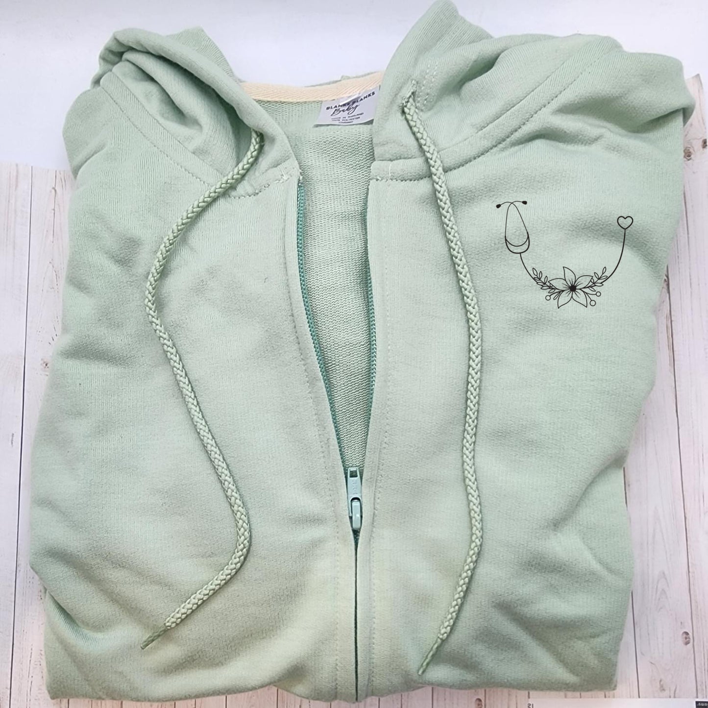 Floral Stethoscope Zip Up Sweater